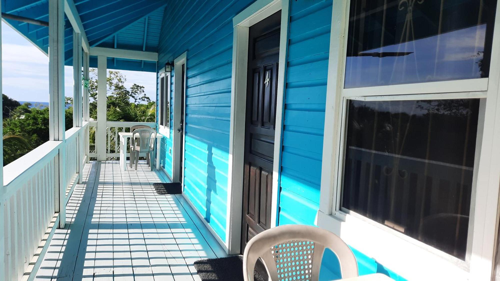 Guava Grove Resort & Villas Sandy Bay Quarto foto